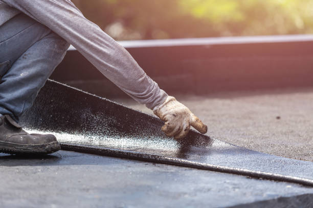 Professional Waterproofing technician working in Tuscaloosa, AL